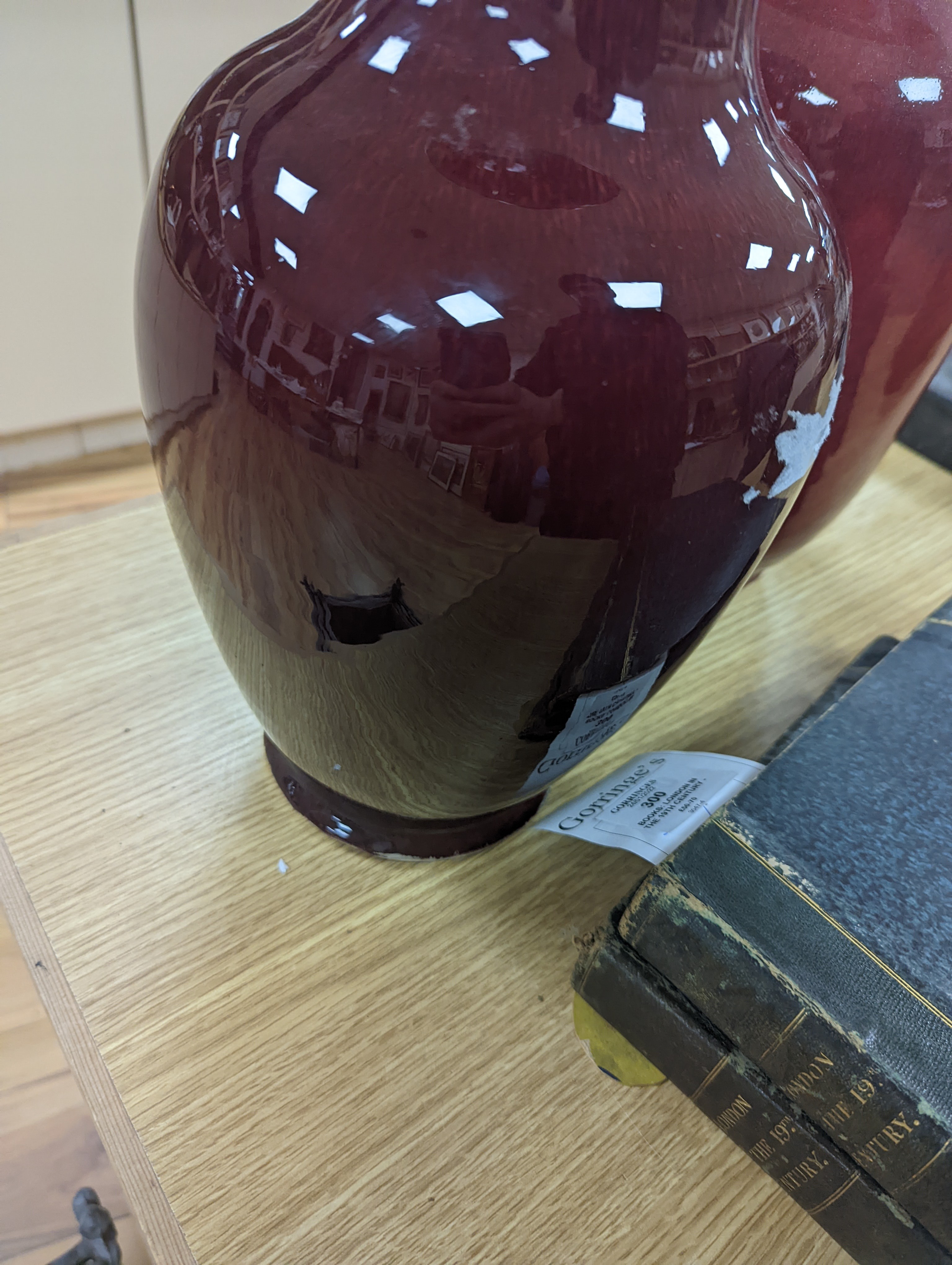 Two large Chinese sang de boeuf glazed vases tallest 36cm